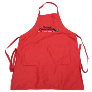 Red apron with the Camp Chautauqua logo embroidered on it
